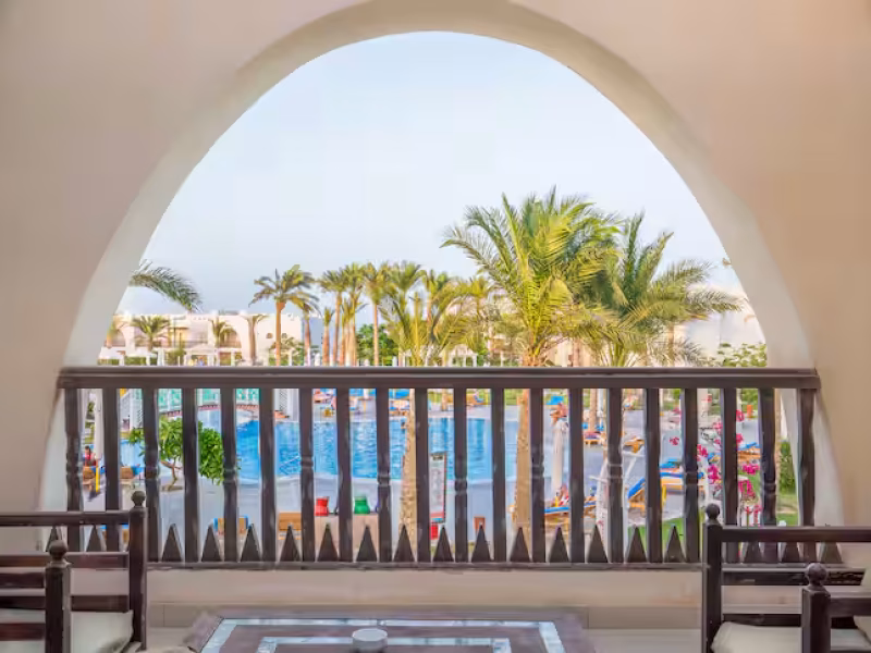 king guest room with pool view at Hilton Marsa Alam Nubian Resort
